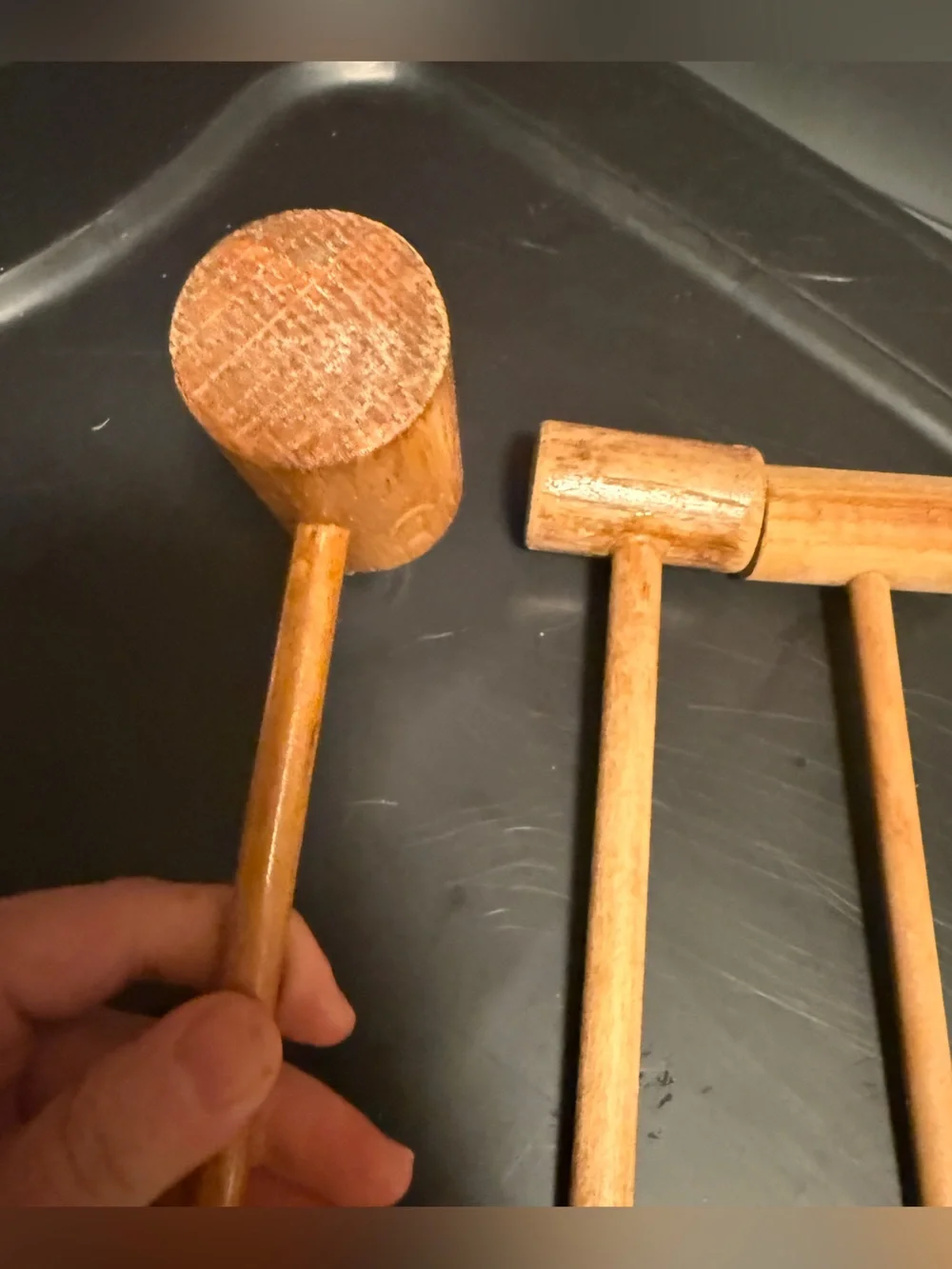traditional wooden mallets, commonly used for tasks like cracking shellfish,